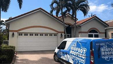 a crew of roofers installing shingles