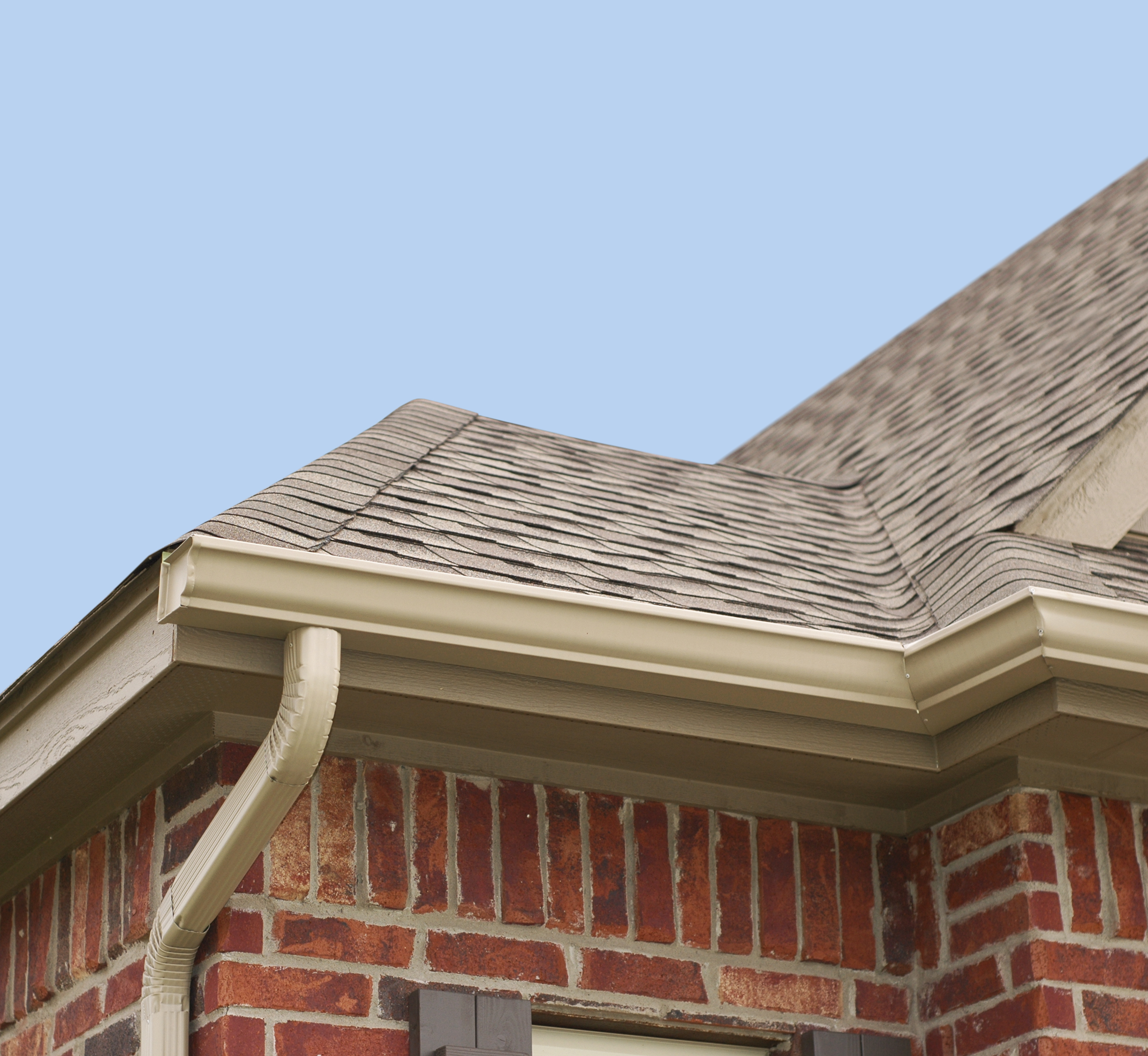 Newly installed gutters on a bricked home in Jacksonville Florida.